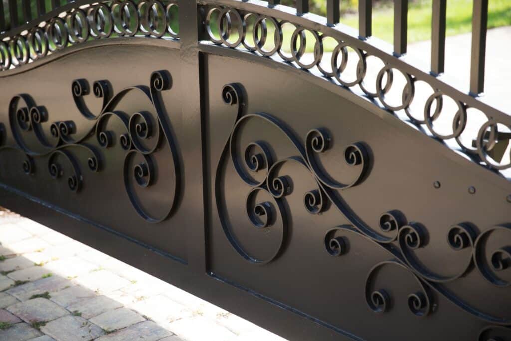 Florida Outdoor Products - Exquisite Scrollwork Detail on Custom Gate